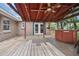 Wooden deck with covered patio and hot tub at 139 Floridana Rd, Debary, FL 32713