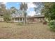 Spacious backyard with a large deck and shed at 139 Floridana Rd, Debary, FL 32713