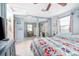 Bedroom with large windows and rocking chair at 139 Floridana Rd, Debary, FL 32713