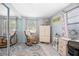 Bedroom with rocking chair and built-in wardrobe at 139 Floridana Rd, Debary, FL 32713