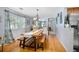 Dining room with wood farm table and benches at 139 Floridana Rd, Debary, FL 32713
