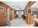 Bright entryway with wood-paneled walls and tile floors at 139 Floridana Rd, Debary, FL 32713