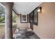 Front porch entry with stone tile flooring at 139 Floridana Rd, Debary, FL 32713