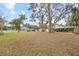 House and large front yard with mature trees at 139 Floridana Rd, Debary, FL 32713