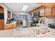 Kitchen with stainless steel appliances and wood cabinets at 139 Floridana Rd, Debary, FL 32713
