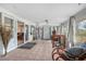 Spacious sunroom with tiled floors and plenty of natural light at 139 Floridana Rd, Debary, FL 32713