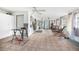 Functional sunroom with bar-height table and additional seating at 139 Floridana Rd, Debary, FL 32713