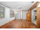 Sunroom with hexagonal tile floor and ceiling fan at 139 Floridana Rd, Debary, FL 32713