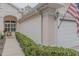 Exterior view of home with walkway and nicely landscaped area at 1469 Carlow Cir, Ormond Beach, FL 32174