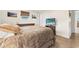 Bedroom with double bed, wood furniture, and tiled floors at 15 Longfellow Cir, Ormond Beach, FL 32176