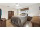 Bedroom with a double bed, wood furniture, and tiled floors at 15 Longfellow Cir, Ormond Beach, FL 32176