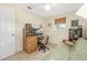 Home office with a desk, chair, and sofa at 15 Longfellow Cir, Ormond Beach, FL 32176