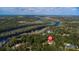 Aerial view showing home's location near the river at 163 Laurelwood Ln, Ormond Beach, FL 32174