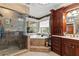 Spa-like bathroom featuring a large soaking tub and walk-in shower at 163 Laurelwood Ln, Ormond Beach, FL 32174