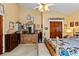 Bright bedroom with a dresser, a comfortable bed, and plenty of closet space at 163 Laurelwood Ln, Ormond Beach, FL 32174