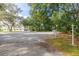 Circular driveway leading to a home with a mailbox at 163 Laurelwood Ln, Ormond Beach, FL 32174