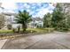 Two-story house with a stone facade and landscaping at 163 Laurelwood Ln, Ormond Beach, FL 32174
