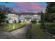 Two-story house with a walkway leading to the front entrance at 163 Laurelwood Ln, Ormond Beach, FL 32174