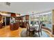 Island kitchen with granite countertops and wood cabinets at 163 Laurelwood Ln, Ormond Beach, FL 32174