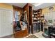 Laundry room with sink, storage cabinets, and built-in bench at 163 Laurelwood Ln, Ormond Beach, FL 32174