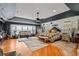 Large main bedroom with sitting area and hardwood floors at 163 Laurelwood Ln, Ormond Beach, FL 32174