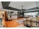 Luxurious main bedroom with hardwood floors and a sitting area at 163 Laurelwood Ln, Ormond Beach, FL 32174
