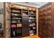 Well-organized pantry with ample shelving for storage at 163 Laurelwood Ln, Ormond Beach, FL 32174