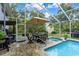 Covered patio and pool area with seating at 163 Laurelwood Ln, Ormond Beach, FL 32174