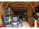 Well-organized storage shed with lawn equipment at 163 Laurelwood Ln, Ormond Beach, FL 32174