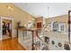 Upstairs hallway with hardwood floors and views to the lower level at 163 Laurelwood Ln, Ormond Beach, FL 32174