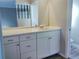 Modern bathroom with double vanity and quartz countertop at 1848 Ridgewood St, Deland, FL 32720