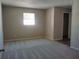 Spacious bedroom with neutral walls and carpet flooring at 1848 Ridgewood St, Deland, FL 32720