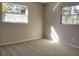 Bright bedroom with carpet flooring and large windows at 1848 Ridgewood St, Deland, FL 32720