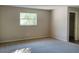 Spacious bedroom with neutral walls and carpet flooring at 1848 Ridgewood St, Deland, FL 32720