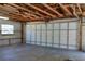 Spacious garage with overhead door and ample storage at 1848 Ridgewood St, Deland, FL 32720
