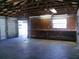 Garage workshop with workbench and overhead storage at 1848 Ridgewood St, Deland, FL 32720