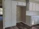 White kitchen cabinets and ample storage space at 1848 Ridgewood St, Deland, FL 32720