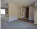 Spacious living area with carpeted floors and a half wall at 1848 Ridgewood St, Deland, FL 32720