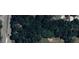 Aerial view of a wooded lot at 1937 N Spring Garden Ave, Deland, FL 32720