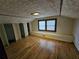 Charming attic bedroom with hardwood floors and spacious closets at 1937 N Spring Garden Ave, Deland, FL 32720