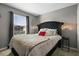 Bedroom with plush queen bed and window lighting at 2353 Carrabelle Way, Sanford, FL 32771