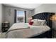 Bedroom with plush queen bed and window lighting at 2353 Carrabelle Way, Sanford, FL 32771