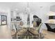 Bright dining area with glass table and four chairs at 2353 Carrabelle Way, Sanford, FL 32771