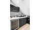 Under-stair wet bar with wine rack and quartz countertop at 2353 Carrabelle Way, Sanford, FL 32771