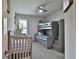 Bedroom with a crib, bunk beds, and plenty of space for  at 2423 Wild Turkey Creek Ln, Port Orange, FL 32128