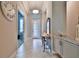 Bright entryway with tile floors and a decorative console table at 2423 Wild Turkey Creek Ln, Port Orange, FL 32128