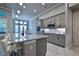 Modern kitchen with a large island and granite countertops at 2423 Wild Turkey Creek Ln, Port Orange, FL 32128