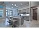 Spacious kitchen, granite island, stainless steel appliances at 2423 Wild Turkey Creek Ln, Port Orange, FL 32128