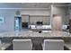 Granite island kitchen with stainless steel appliances at 2423 Wild Turkey Creek Ln, Port Orange, FL 32128