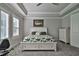 Spacious main bedroom with a king-size bed and plenty of natural light at 2423 Wild Turkey Creek Ln, Port Orange, FL 32128